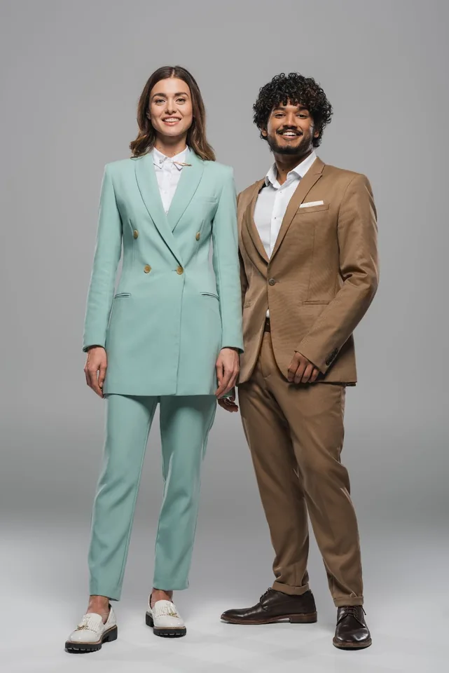 Man and woman in tailored suits